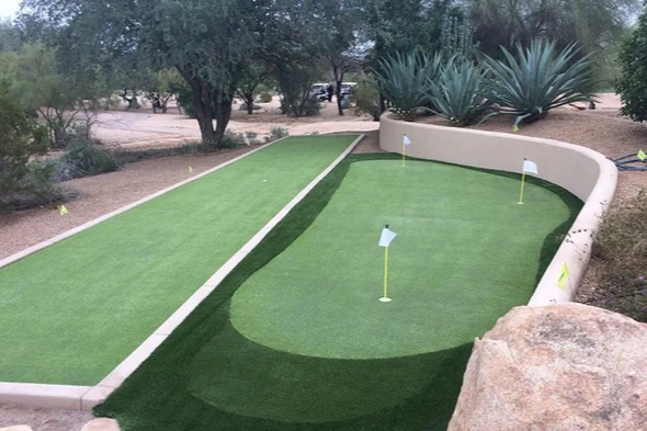 Phoenix backyard putting green with bocce court next to it